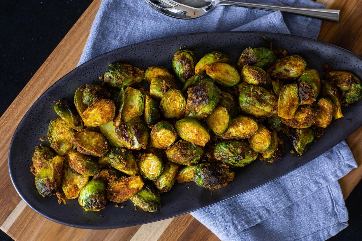 Smoked curry Brussels sprouts, a recipe in Dallas McGarity's cookbook “Indoor Smoker. Outdoor Flavor.” made specifically for the GE Profile Smart Indoor Smoker.