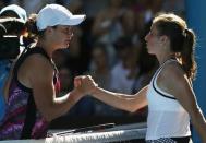 Tennis - Australian Open - Melbourne Park, Melbourne, Australia - 16/1/17 Australia's Ashleigh Barty shakes hands as she celebrates winning the Women's singles first round match against Germany's Annika Beck. REUTERS/Issei Kato