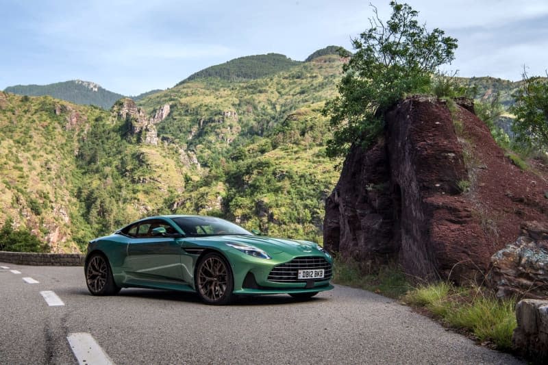 Aston Martin DB12 has boosted the kerbside appeal of its top sports car DB12 with new, smoother looks and a muscular power from a tuned V8 combustion engine. This car will thrill petrolheads - and maybe future filmgoers as well. Aston Martin/dpa