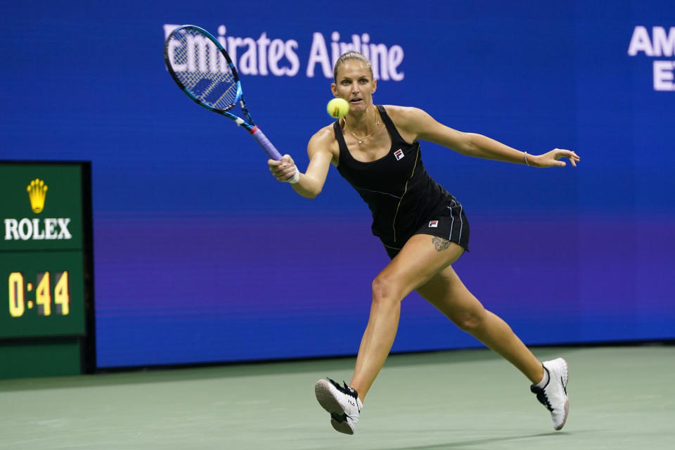 Karolina Pliskova, of the Czech Republic, returns a shot to Amanda Anisimova, of the United States, during the second round of the US Open tennis championships, Thursday, Sept. 2, 2021, in New York. (AP Photo/Frank Franklin II)