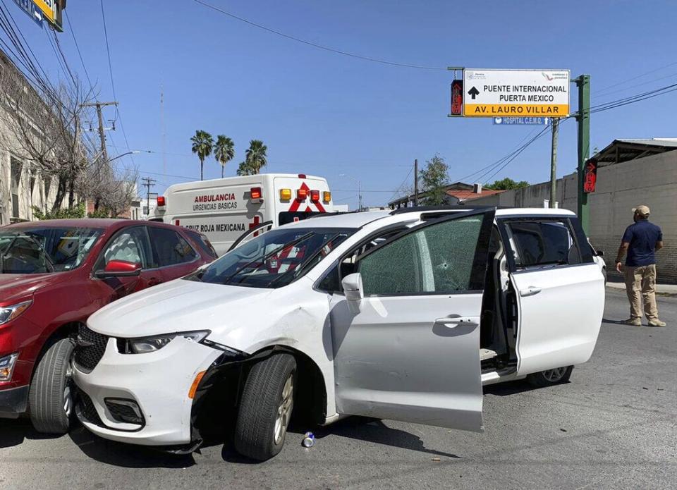 A white minivan with doors open