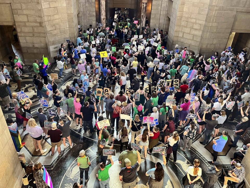 In May 2023, hundreds of people gathered in the Nebraska Capitol to protest a proposal to fold an abortion ban into a bill banning gender-affirming care for trans youth. <a href="https://newsroom.ap.org/detail/TransHealthAbortionNebraska/0fd1175c15ae4ed6ab18f34d0ae09ae8" rel="nofollow noopener" target="_blank" data-ylk="slk:AP Photo/Margery Beck;elm:context_link;itc:0;sec:content-canvas" class="link ">AP Photo/Margery Beck</a>