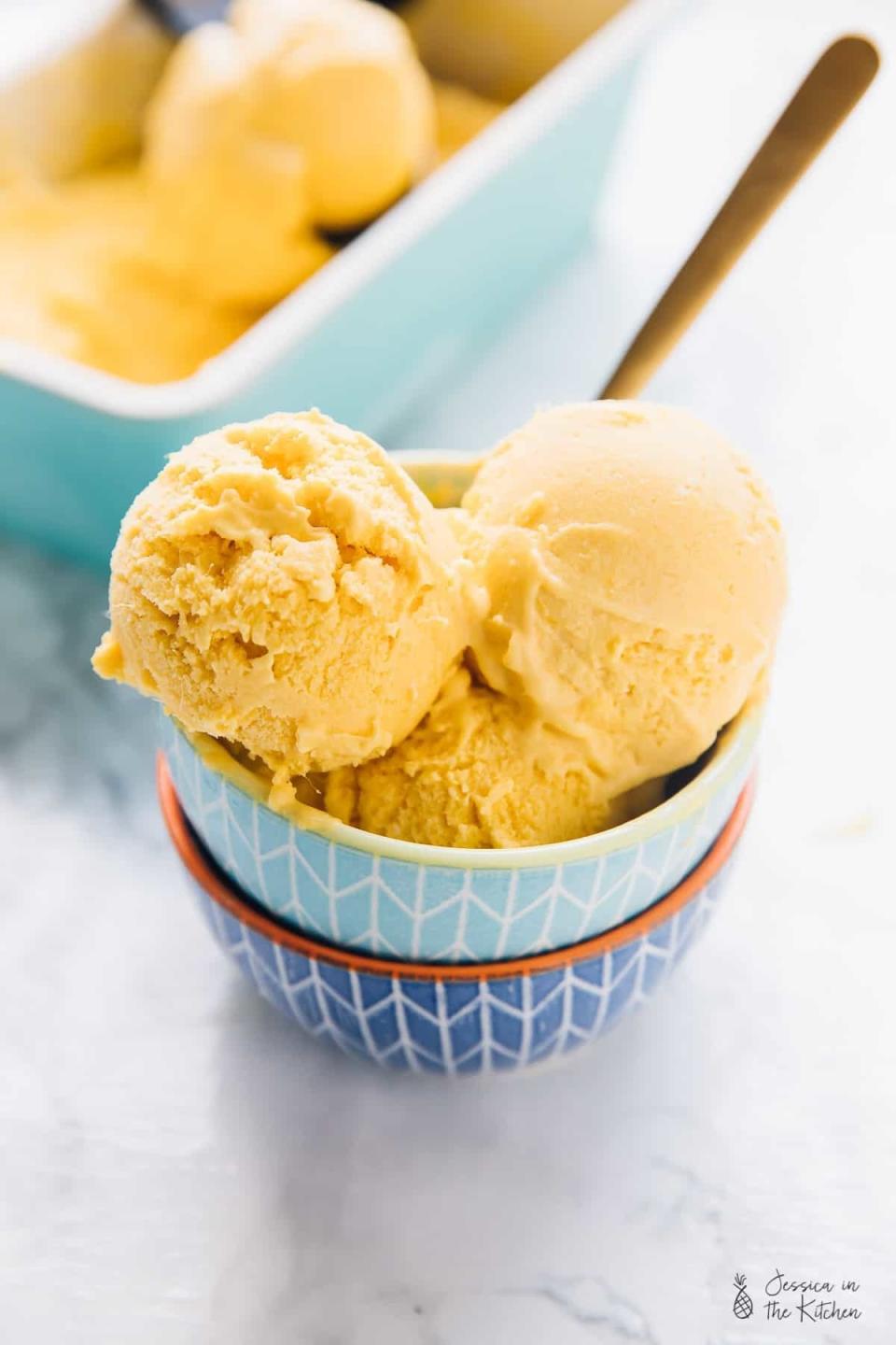 No-churn mango ice cream in a bowl.