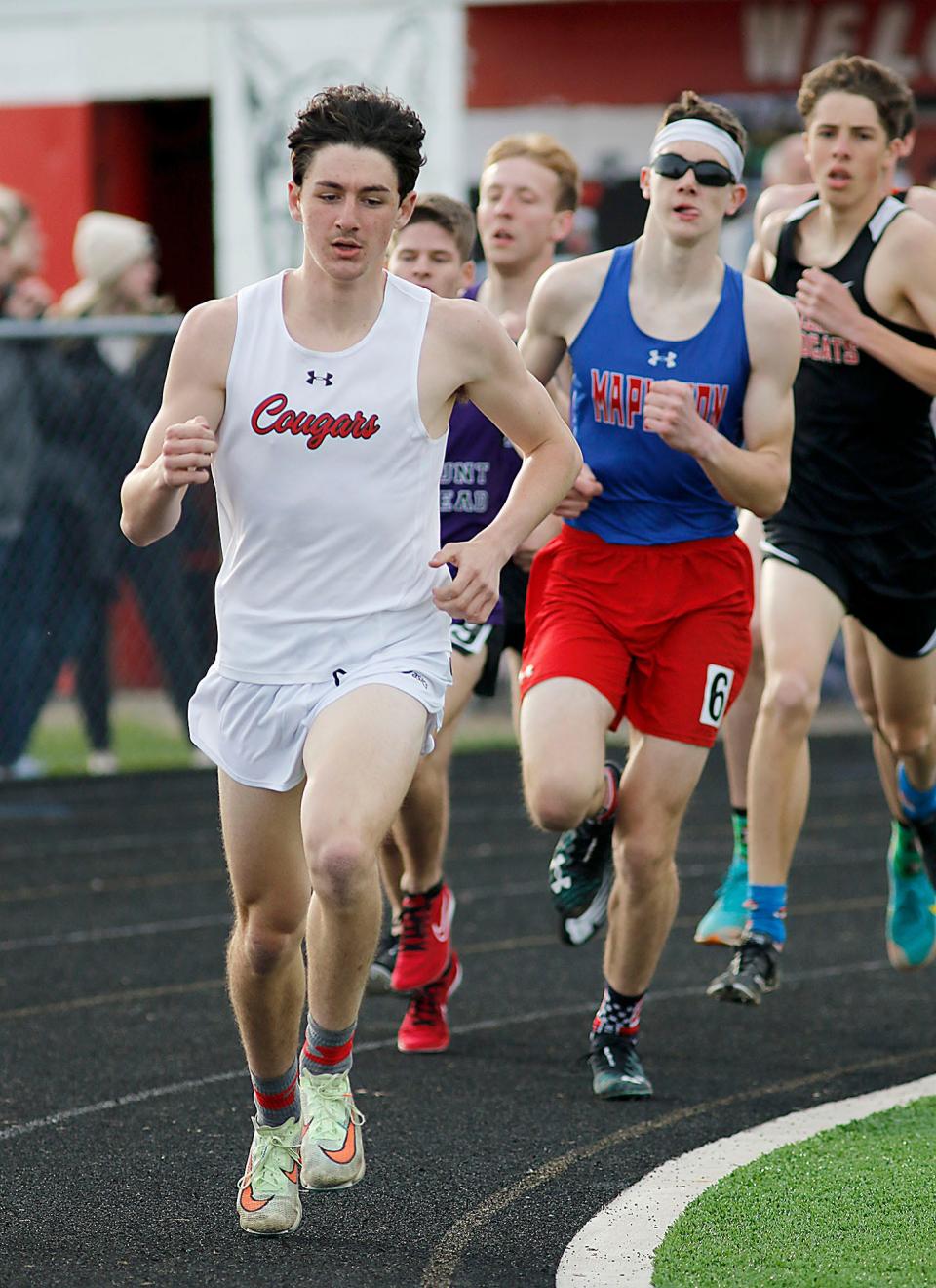 Crestview's Tommy O'Neill competes in the 1600 meter run during the Forrest Pruner Track Invitational at Crestview High School on Friday, April 22, 2022.