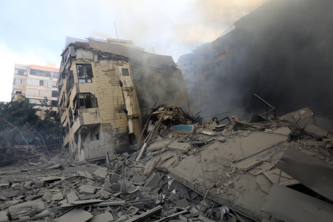 Smoke rises from buildings hit in an overnight Israeli airstrike that targeted the neighbourhood of Al-Jamous in Beirut's southern suburbs on October 3, 2024. Israel kept up its bombardment of Beirut after Iran launched its second, and largest, attack on Israel in months, which prompted Prime Minister Benjamin Netanyahu to warn Tehran would pay. (Photo by AFP) (Photo by -/AFP via Getty Images)