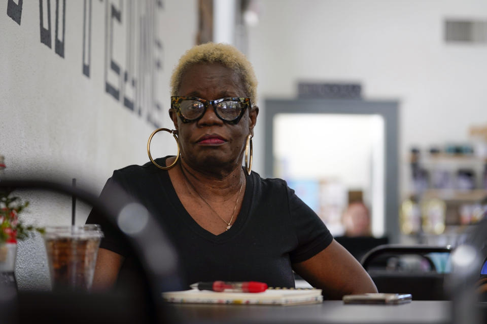 Betty Shinn, 72, poses for a photograph at a coffee shop in in Mobile, Ala., June 2, 2023. A U.S. Supreme Court decision a decade ago that tossed out the heart of the Voting Rights Act continues to reverberate across the country. Republican-led states continue to pass voting restrictions that, in several cases, would have been subject to federal review had the court left the provision intact. Alabama could add another to the list soon, one that would make it a crime to help a non-family member fill out or return an absentee ballot. "This is voter suppression at its best," said Shinn, who recently testified against the bill during a legislative hearing in Montgomery. "It's no different from asking me how many jellybeans are in that jar or asking me to recite the Constitution from memory." (AP Photo/Gerald Herbert)