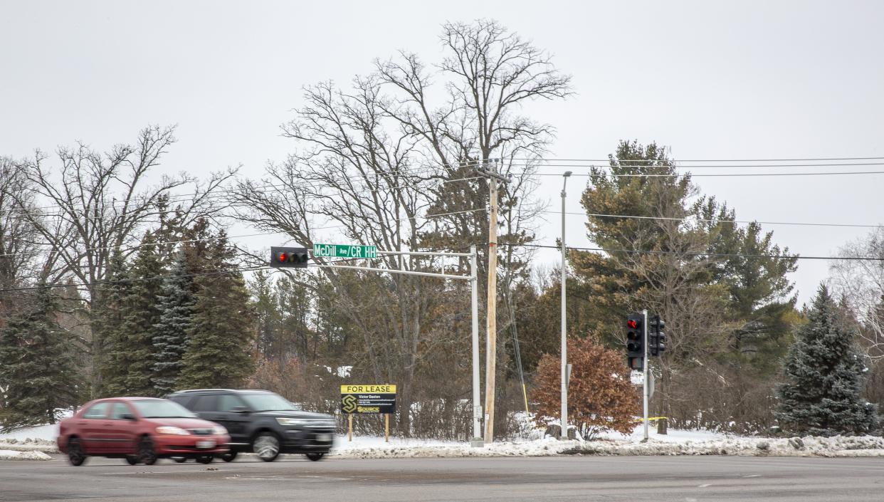 Cars zip by an 18-acre plot of land available for commercial development at 3383 Hoover Road in Stevens Point on Jan. 23. Victor Baeten, president of Source Commercial Real Estate, said he was looking at development opportunities in Stevens Point when he saw the site and the owners eventually agreed to sell.