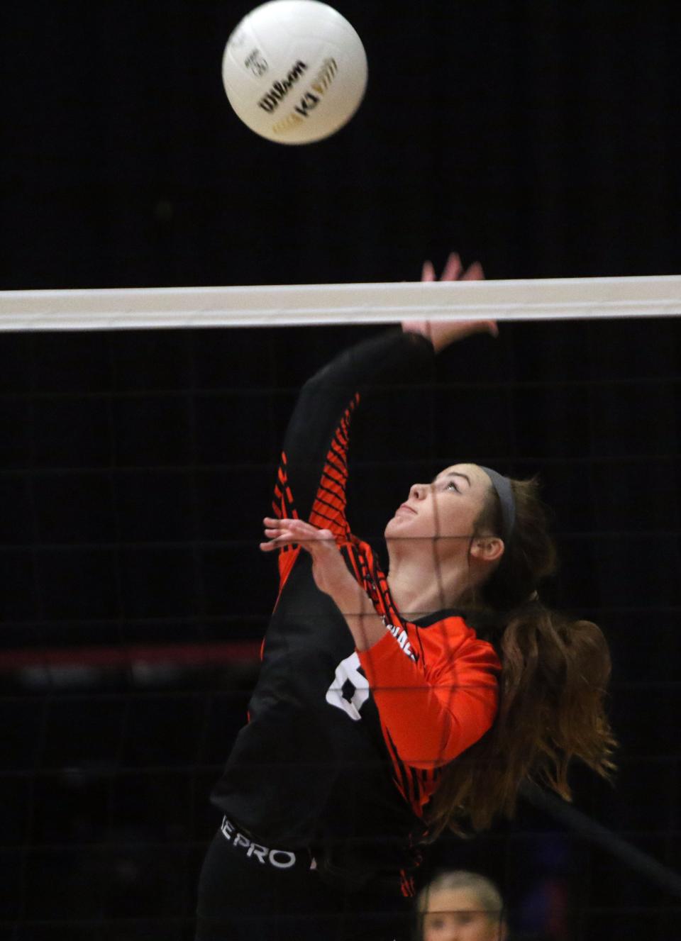 Lake Wales' Lily Weaver goes up for a kill against Victory Christian.
