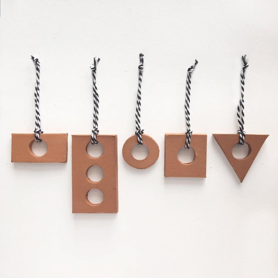 <p>For a thoroughly contemporary Christmas, look to London design studio Darkroom’s industrial-look decorations. </p><p>£25 for a set of five, <a href="https://darkroomlondon.com/collections/christmas/products/terracotta-christmas-pendant-set-small" rel="nofollow noopener" target="_blank" data-ylk="slk:darkroomlondon.com" class="link rapid-noclick-resp">darkroomlondon.com</a></p>