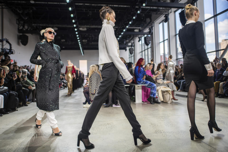 The Badgley Mischka collection is modeled at Spring Studios during NYFW Fall/Winter 2020 on Saturday, Feb. 8, 2020, in New York. (Photo by Charles Sykes/Invision/AP)