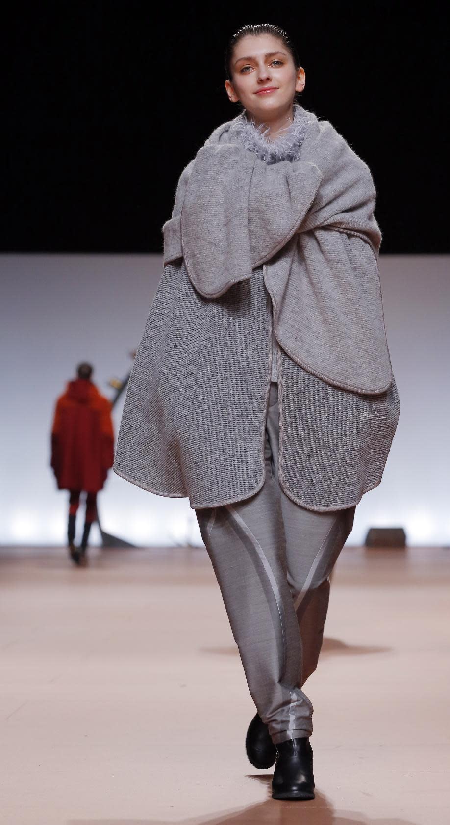 A model wears a creation for Issey Miyake's ready to wear fall/winter 2014-2015 fashion collection presented in Paris, Friday, Feb.28, 2014. (AP Photo/Jerome Delay)