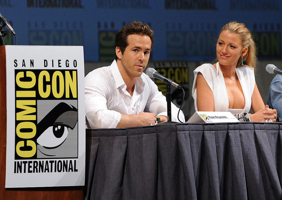 the couple sitting next to each other at Comic Con