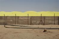 Sulfuric acid used for heap leaching is seen at Areva's Somair uranium mining facility in Arlit, September 25, 2013. Picture taken September 25, 2013. REUTERS/Joe Penney