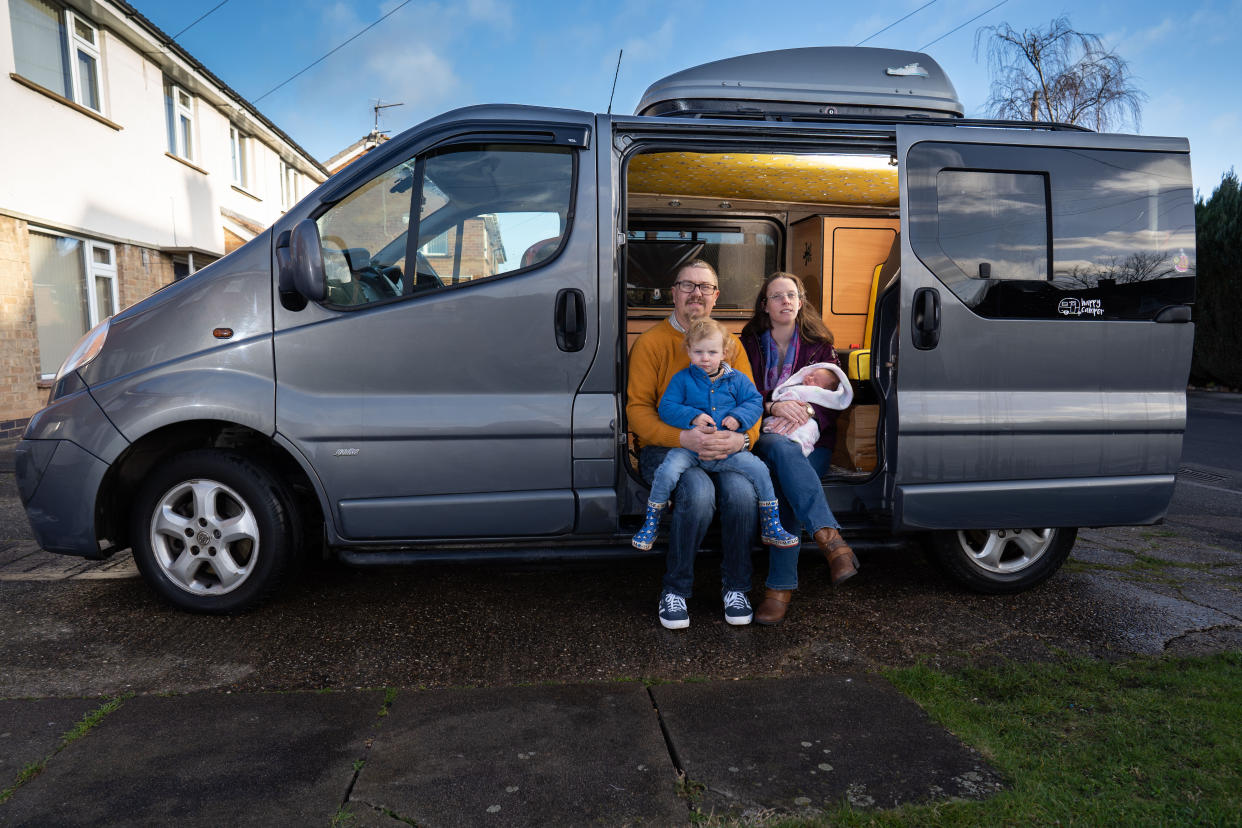 Dominic Lister delivered his own child for a second time after his wife went into labour in their camper van, pictured Dominic Lister, Natalie Lister, son Elliot Lister, and baby Alice Lister with their camper van. (SWNS)