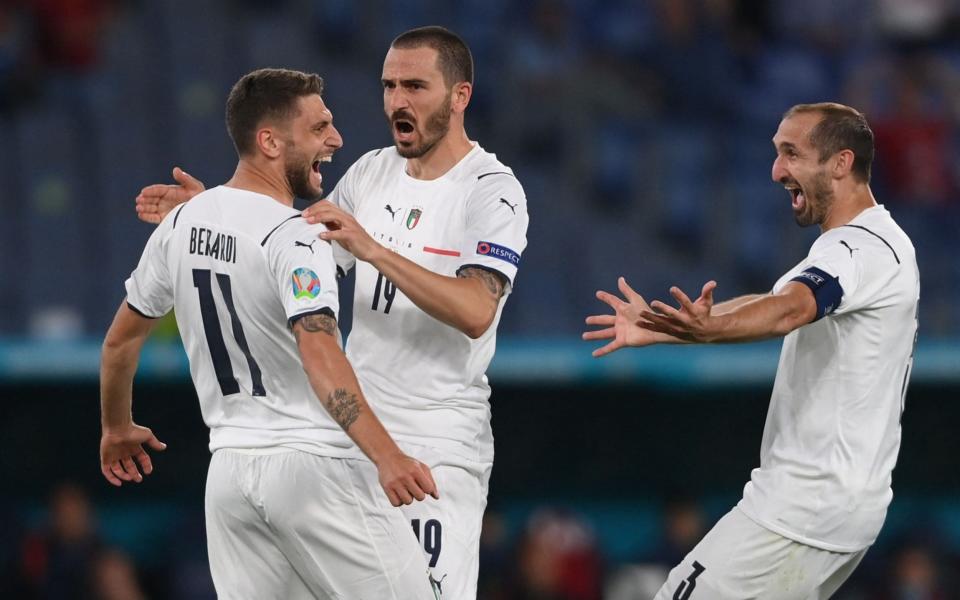 Italy's forward Domenico Berardi, Italy's defender Leonardo Bonucci and Italy's defender Giorgio Chiellini celebrate - AFP