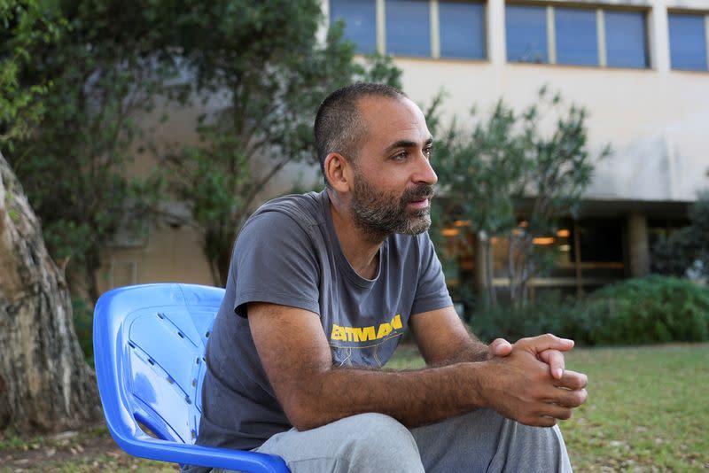 Avihai Brodutch, whose wife and three children were abducted by Hamas militants on October 7 from their home in Kibbutz Kfar Aza, is photographed during an interview with Reuters