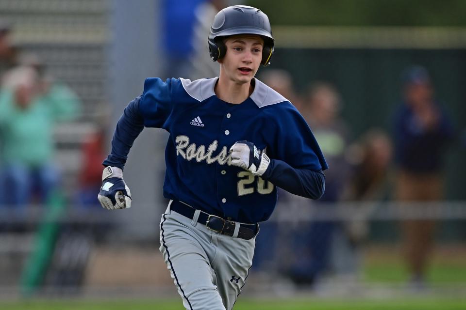 Rootstown's Joe Weaver runs to first base after hitting a two-run single in the second inning of their district semifinal against Cardinal Mooney at Cene Park in Struthers.