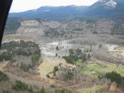 An aerial view of the area affected by a landslide near State Route 530 is seen in this handout photo provided by the Governor Jay Inslee's office taken near Oso, Washington in this March 23, 2014 picture provided by Gov Jay Inslee's office. REUTERS/Gov Jay Inslee's office/Handout via Reuters