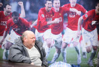 <p>United legends charge a fan waiting for the ground to open </p>