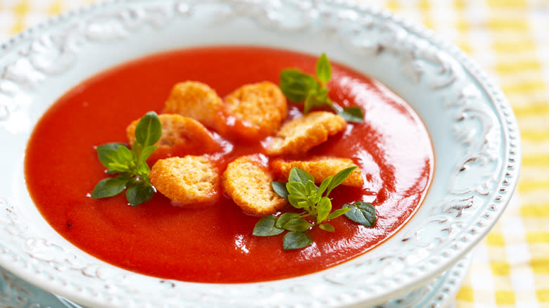 Tomato soup topped with croutons
