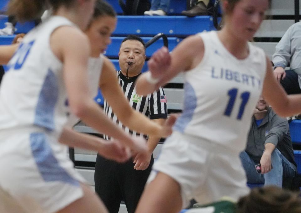 Official John Cha watches the action during the Dublin Jerome at Olentangy Liberty girls basketball game Jan. 12.