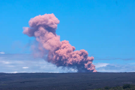 An ash cloud rises above Kilauea Volcano after it erupted, on Hawaii's Big Island May 3, 2018, in this photo obtained from social media. Janice Wei/via REUTERS