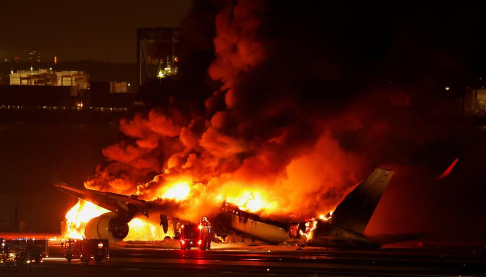 Japan Airlines' A350 airplane on fire at Haneda international airport in Tokyo (Reuters)