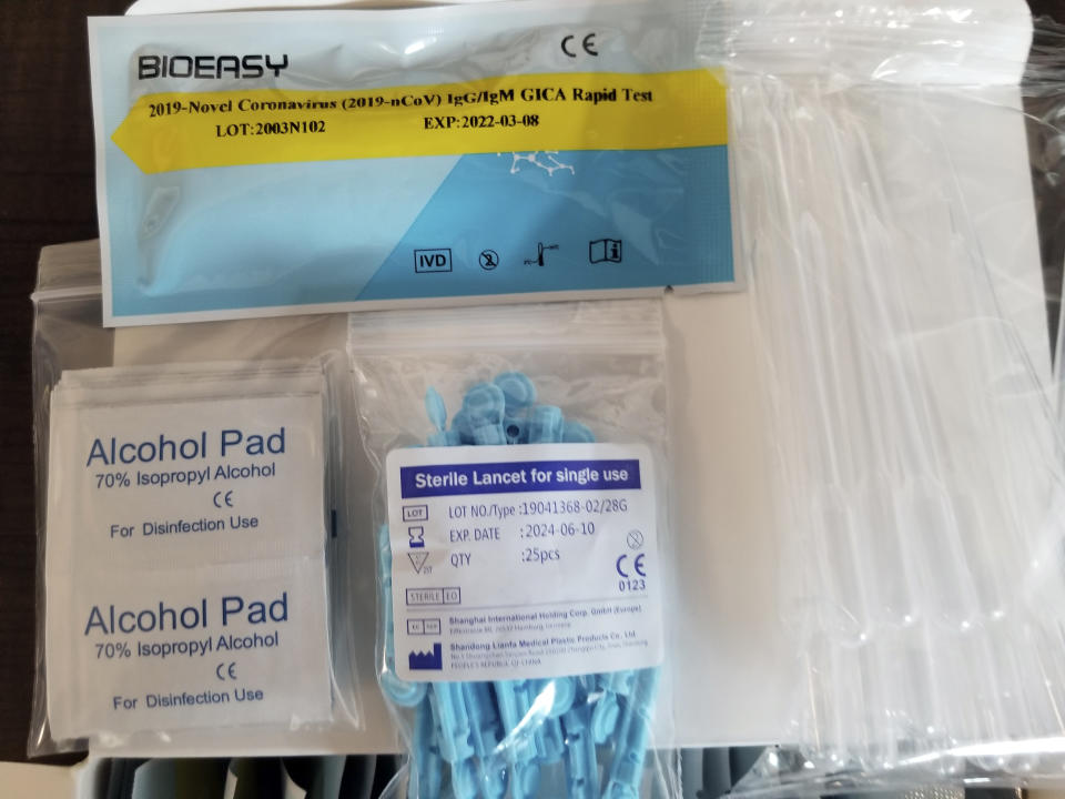 In this image provided by the U.S. Immigration and Customs Enforcement, this March 24, 2020, photo, shows unapproved COVID-19 tests that were seized on March 22, 2020 from the DHL Express Consignment Facility at JFK Airport in the Queens borough of New York. Federal officials say the COVID-19 outbreak has unleashed a wave of fraud. An arm of the Department of Homeland Security, Homeland Security Investigations, has opened more than 300 cases in recent weeks that include counterfeit products and medicines as well as fake tests for the virus. (U.S. Immigration and Customs Enforcement via AP)