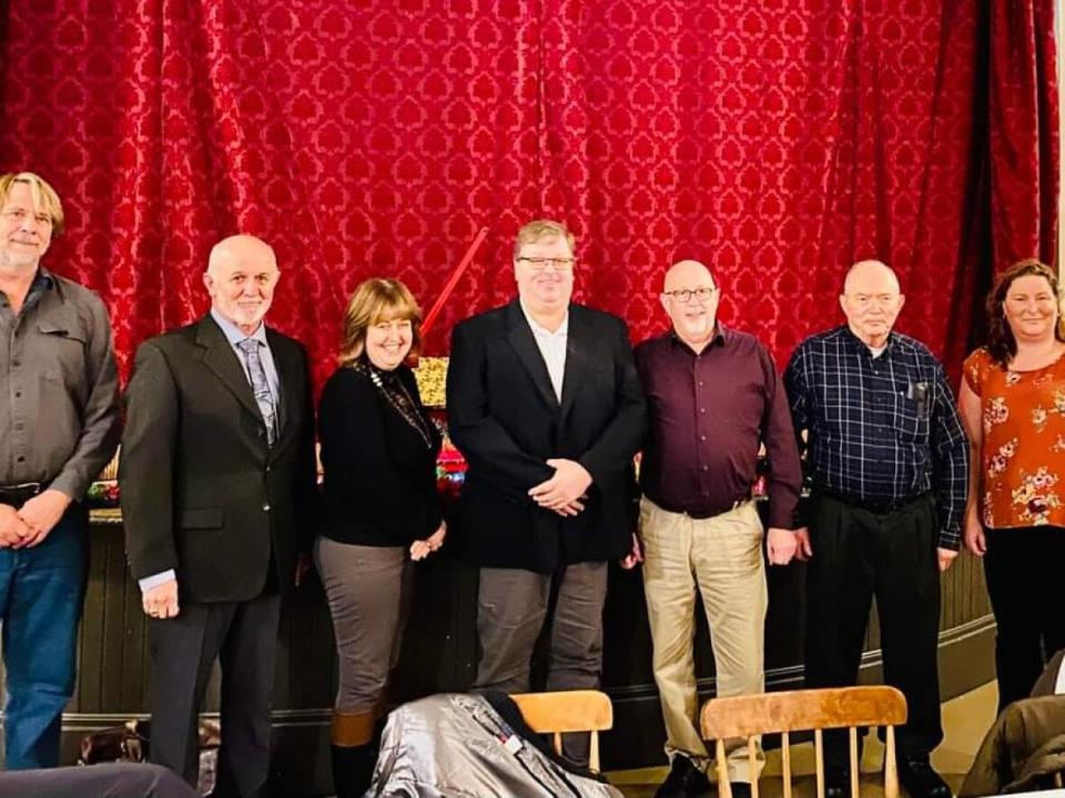 The municipal council of Fundy Albert, with Mayor Bob Roshon, second from the left, and Jeff Jonah, third from the right, will have another look at whether to include a prayer at meetings. (Robert Rochon/Facebook - image credit)