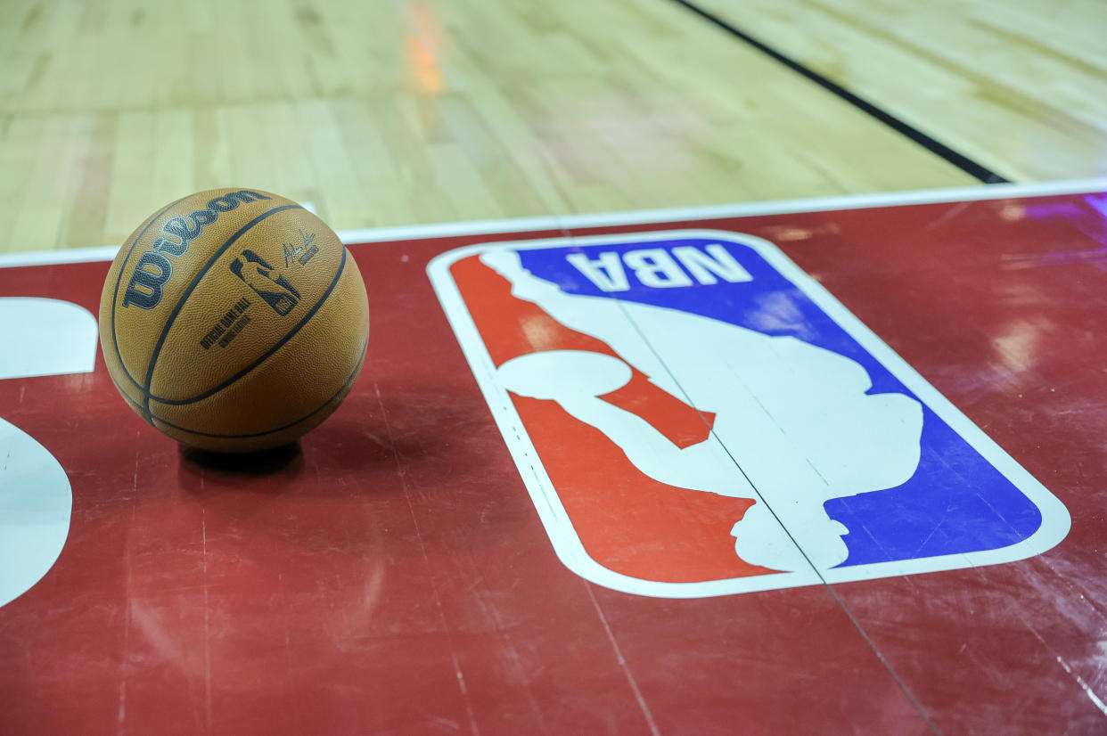 LAS VEGAS, NEVADA - JULY 07: A basketball is placed on the court next to an NBA logo during a break in the first half of a 2023 NBA Summer League game between the Portland Trail Blazers and the Houston Rockets at the Thomas & Mack Center on July 07, 2023 in Las Vegas, Nevada. NOTE TO USER: User expressly acknowledges and agrees that, by downloading and or using this photograph, User is consenting to the terms and conditions of the Getty Images License Agreement. (Photo by Ethan Miller/Getty Images)