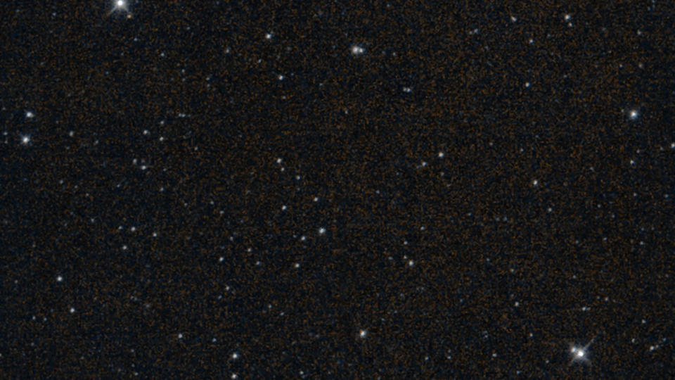 view of a patch of deep space, with many distant stars visible