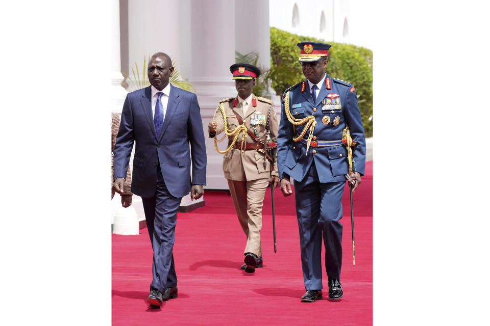 FILE - Kenya's military chief General Francis Ogolla, right, and Kenya's President William Ruto, left, at State House in Nairobi, Kenya, Nov. 14, 2023. Ogolla died in a helicopter crash west of the country, President William Ruto announced Thursday, April 18, 2024, evening and declared three days of national mourning. (AP Photo/Brian Inganga, File)