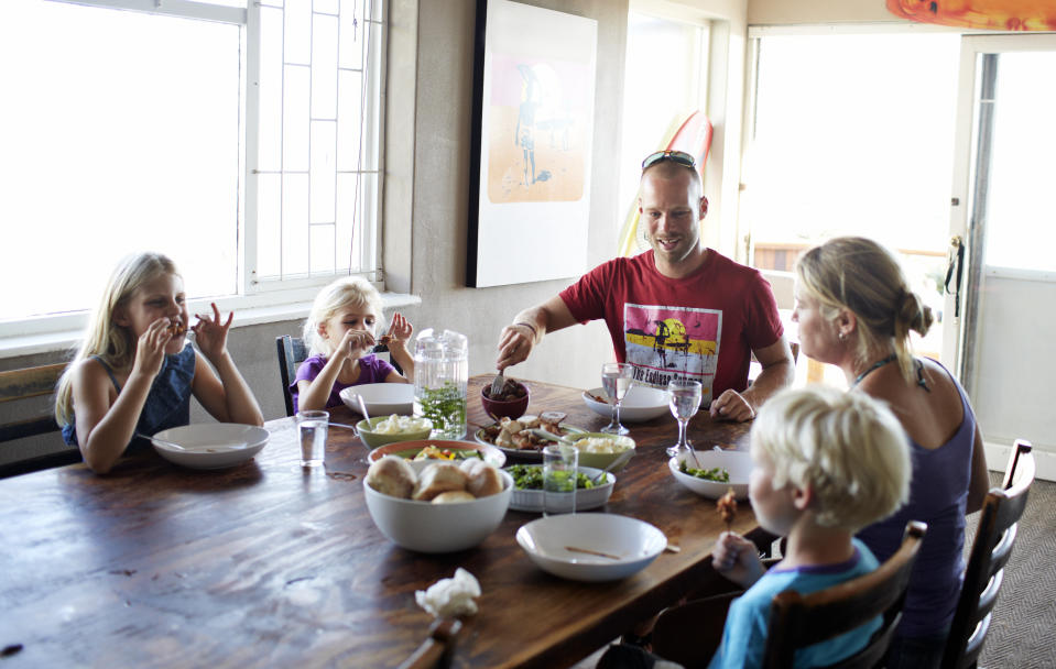 Parents should talk about the benefits of putting their phones away with their children. (Getty Images)