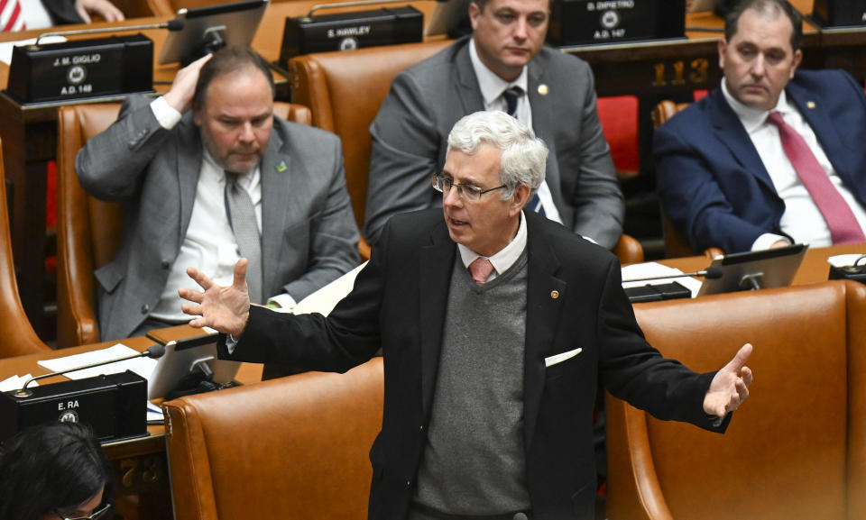 Assemblyman Andy Goodell, R-Jamestown, debates legislation to approve a legislative pay raise during a special legislative session in the Assembly Chamber at the state Capitol Thursday, Dec. 22, 2022, in Albany, N.Y. (AP Photo/Hans Pennink)