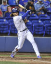 Toronto Blue Jays' Bo Bichette follows through on a two-run double off Los Angeles Angels reliever Jaime Barria during the fourth inning of a baseball game Saturday, April 10, 2021, in Dunedin, Fla. (AP Photo/Steve Nesius)