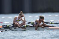 Marieke Keijser and Ilse Paulis, of Netherlands react after competing in the lightweight women's rowing double sculls final at the 2020 Summer Olympics, Thursday, July 29, 2021, in Tokyo, Japan. (AP Photo/Lee Jin-man)