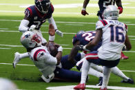 New England Patriots quarterback Cam Newton (1) slides for a first down against the Houston Texans during the first half of an NFL football game, Sunday, Nov. 22, 2020, in Houston. (AP Photo/David J. Phillip)