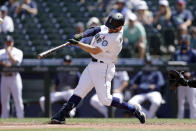 Seattle Mariners' Donovan Walton hits a three-run home run during the fourth inning of a baseball game, Monday, May 31, 2021, in Seattle. (AP Photo/John Froschauer)