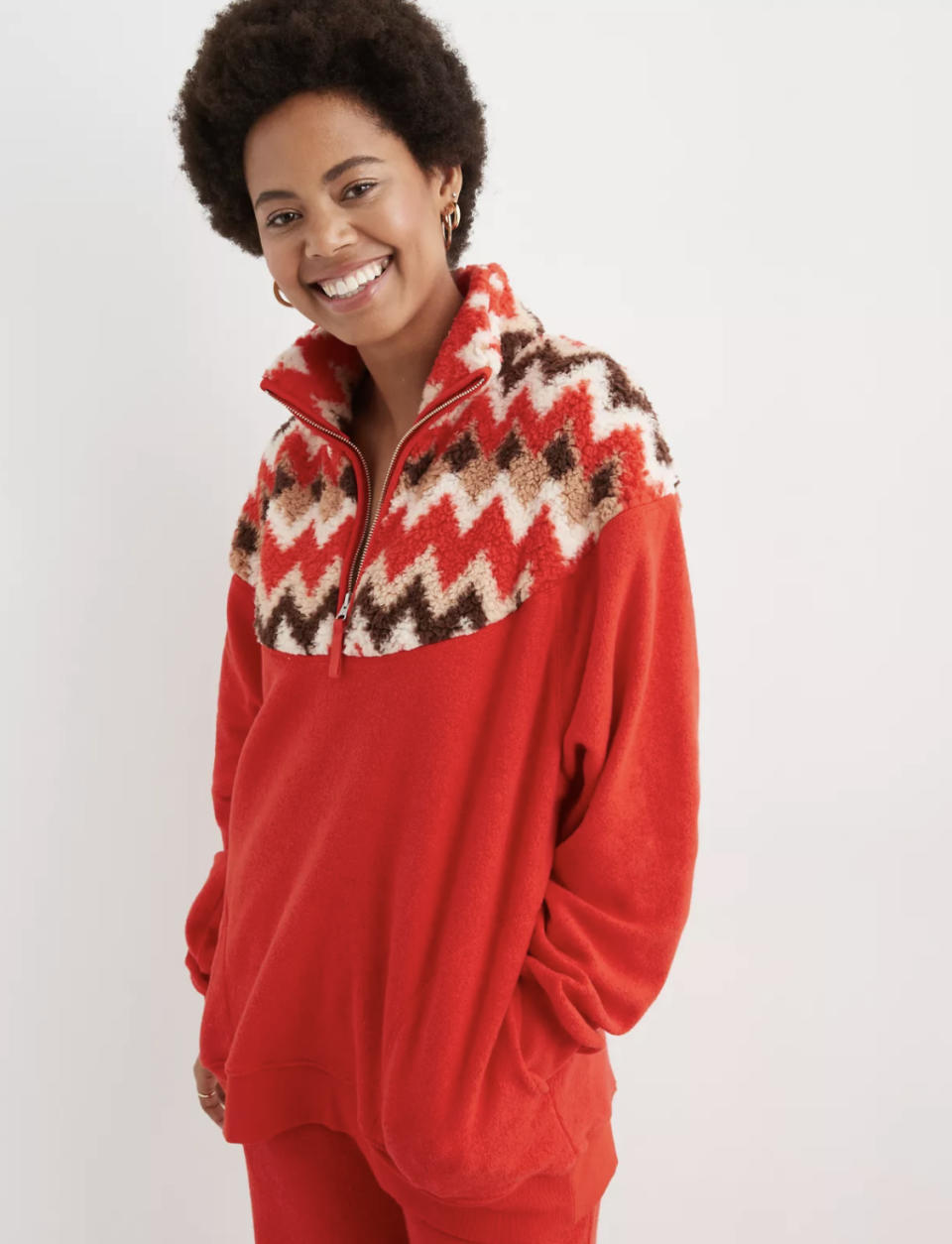 model in the red holiday quarter zip