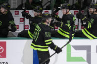Dallas Stars' Ty Dellandrea (10) celebrates with the bench after scoring in the first period of an NHL hockey game against the New Jersey Devils, Friday, Jan. 27, 2023, in Dallas. (AP Photo/Tony Gutierrez)