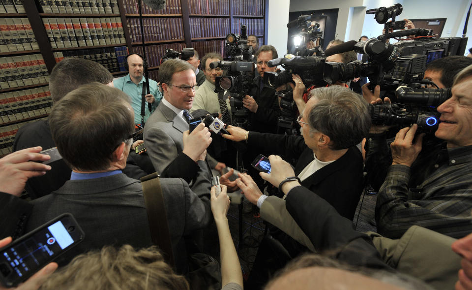 Michigan Attorney General Bill Schuette, center left, speaks about the United States Supreme Court's decision, Tuesday, April 22, 2014, regarding the state's Affirmative Action law involving college admissions, during a news conference in Lansing, Mich. (AP Photo/The Detroit News, Dale G. Young) DETROIT FREE PRESS OUT; HUFFINGTON POST OUT.