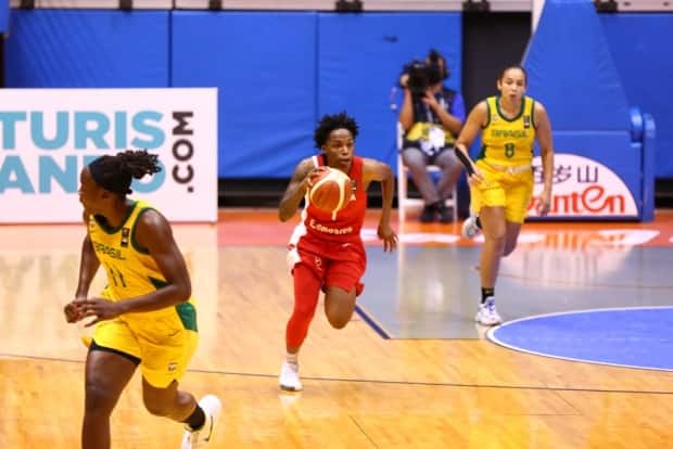 Shaina Pellington, centre, is an explosive guard who can provide instant offence off the bench.  (Submitted by FIBA - image credit)