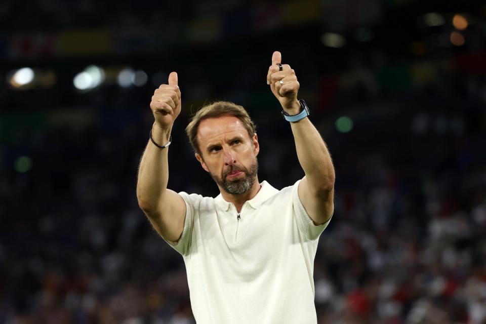 Gareth Southgaten thanks English fans after victory over Slovakia (FA via Getty Images)