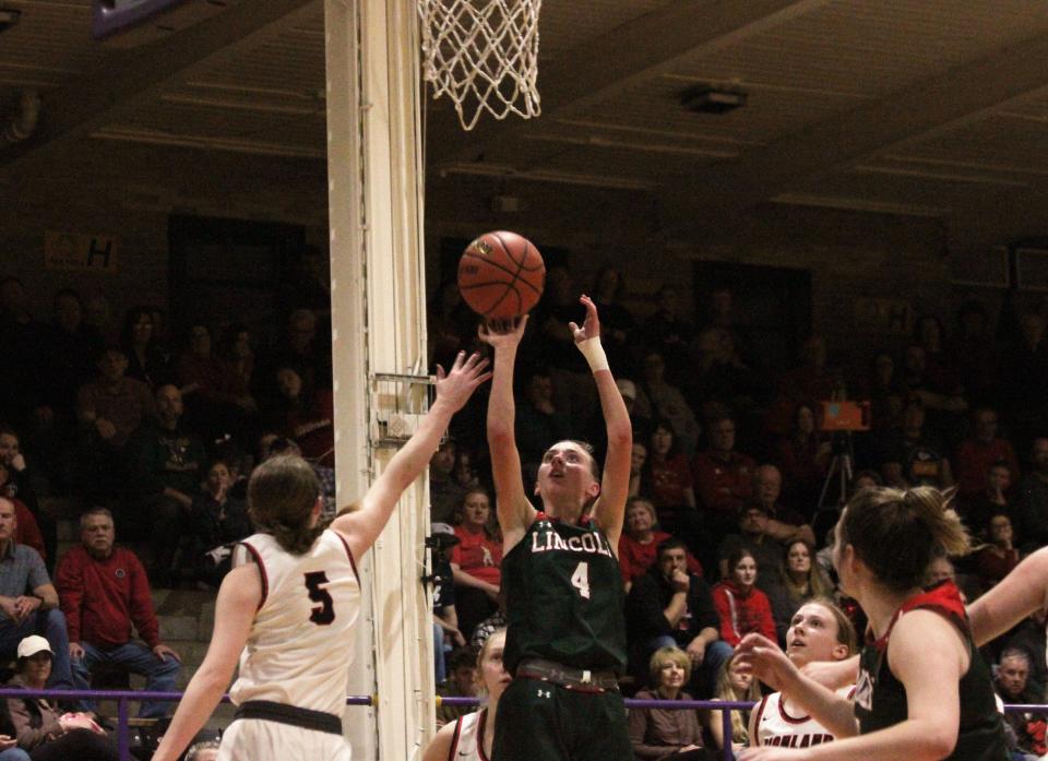 Lincoln's Becca Heitzig releases a shot during the second half against Highland in the Class 3A Taylorville girls basketball supersectional at Dolph Stanley Court on Monday.