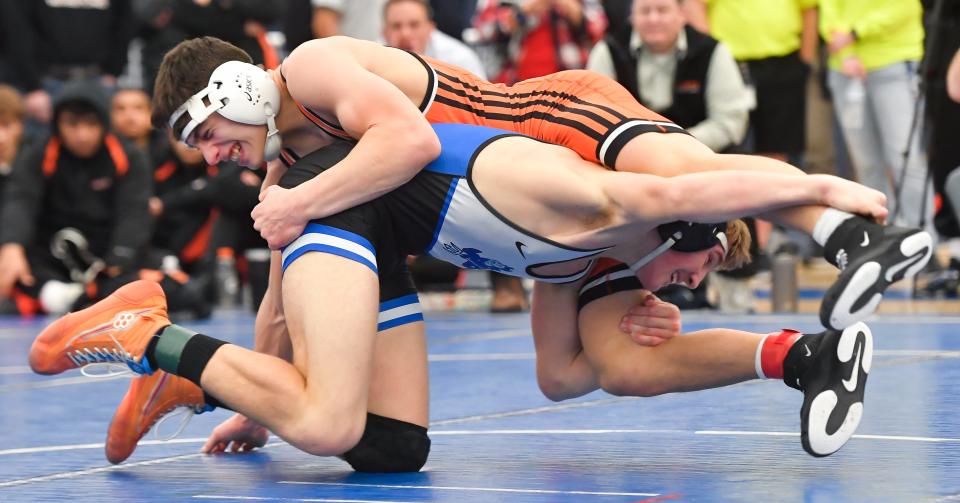 Churchville-Chili’s Andrew Frost, top, wrestles Brockport’s Dylan Fitzgerald in the final of the 170-pound weight class during the Monroe County Wrestling Championships, Saturday, Dec. 16, 2023.