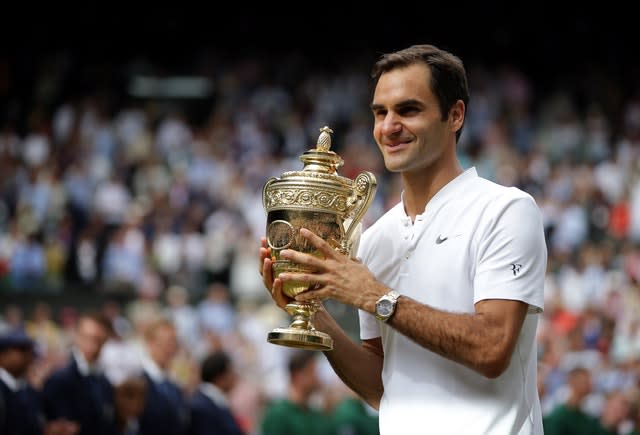 Roger Federer holds the Wimbledon trophy in 2017