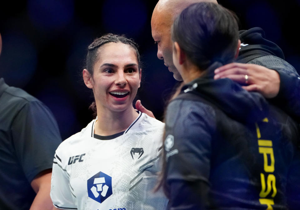 Dec 16, 2023; Las Vegas, Nevada, USA; Ariane Lipski (left) reacts after defeating Casey O’Neill (not pictured) during UFC 296 at T-Mobile Arena. Mandatory Credit: Stephen R. Sylvanie-USA TODAY Sports