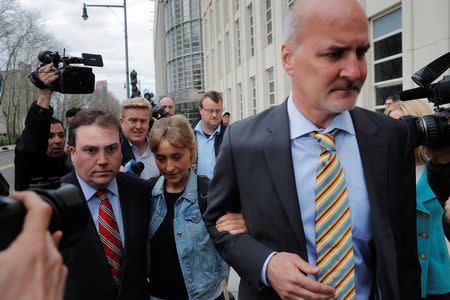 Actress Allison Mack, known for her role in the TV series "Smallville", departs after being granted bail following being charged with sex trafficking and conspiracy in New York, U.S., April 24, 2018. REUTERS/Lucas Jackson