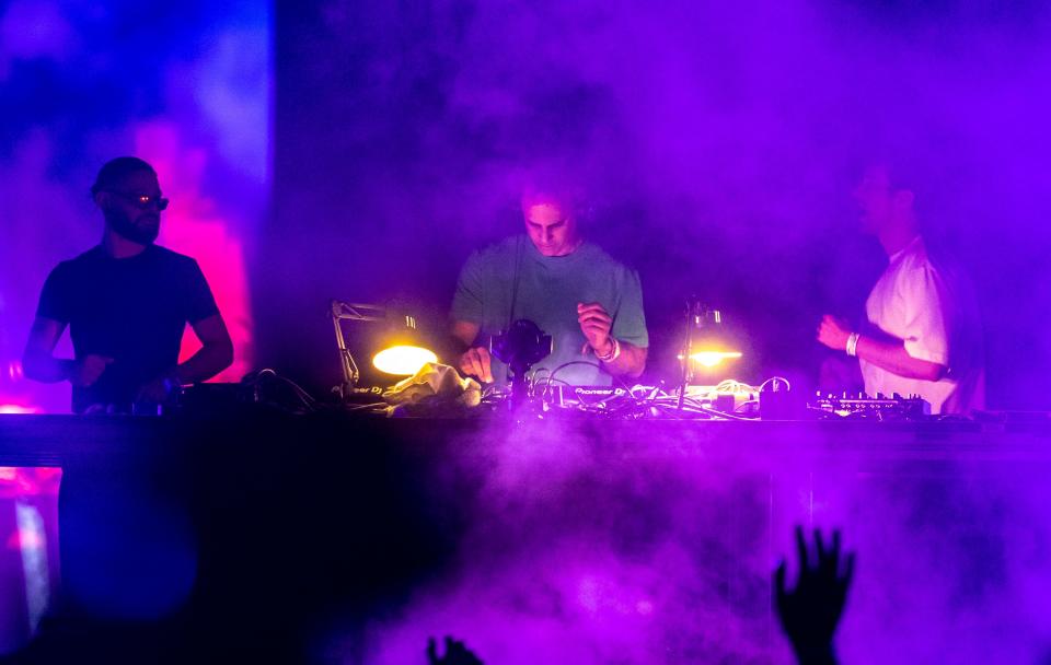 Skrillex (left), Fred Again and Four Tet perform together at the Coachella stage during the Coachella Valley Music and Arts Festival at the Empire Polo Club in Indio, Calif., Saturday, April 22, 2023. 