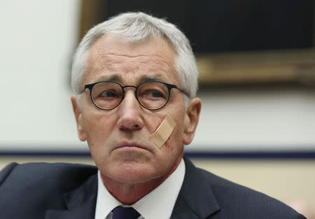 U.S. Secretary of Defense Chuck Hagel listens during his testimony at the House Armed Services Committee on Capitol Hill in Washington, November 13, 2014. REUTERS/Larry Downing